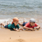 Brothers playing in the sea, Corfu island, Greece